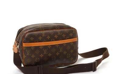 NOT SOLD. Louis Vuitton: A "Reporter PM" bag made of brown monogram coated canvas with...