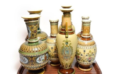 Mettlach vases in the traditional style comprising three pairs and...