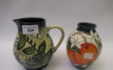 Modern Moorcroft jug decorated with butterflies and foliage,...