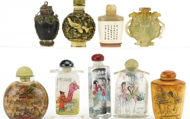 Nine Chinese snuff bottles including a green and russet jade...