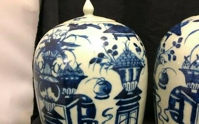 PAIR OF ASIAN BLUE AND WHITE COVERED URNS 15"H X 9"W