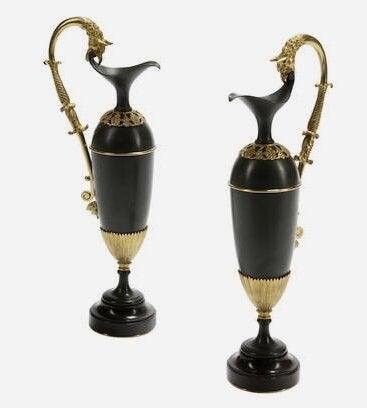 PAIR OF EMPIRE STYLE GILT AND PATINATED BRONZE EWERS