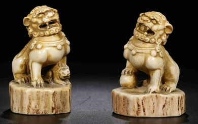 PAIR OF LUJIAO CARVED LION SHAPE PENDANT