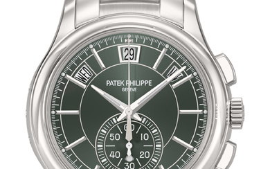 PATEK PHILIPPE. AN ATTRACTIVE STAINLESS STEEL AUTOMATIC ANNUAL CALENDAR FLYBACK...