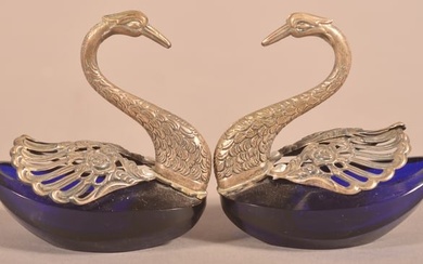 Pair of Silver Mounted Cobalt Glass Swan Salts.