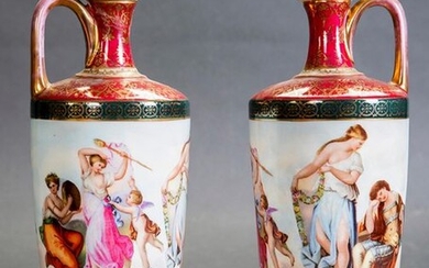Pair of elegant porcelain jugs from Vienna, 19th century. Classic enamel and fretwork scenes and gilt details. Height: 31 cm. Exit: 300uros. (49.916 Ptas.)