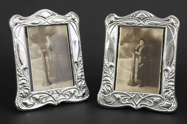Pair of photo frames in marked solid silver...
