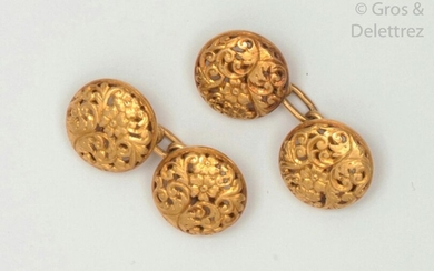 Pair of yellow gold cufflinks, decorated with flowers...