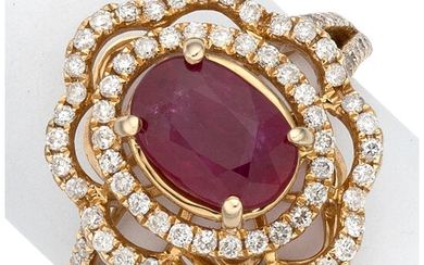 Ruby, Diamond, Gold Ring The ring features an oval-shaped...