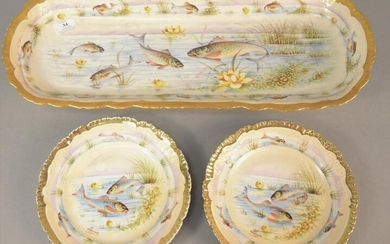 Set of Twelve hand-painted fish plates along with a