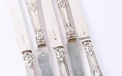 Set of five silver fruit knives, the handle filled with rinceaux and cartouches decorated with a fantastic animal head surmounted by a numbered coat of arms, the silver blade marked Odiot.
