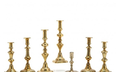Seven Antique Brass Candlesticks