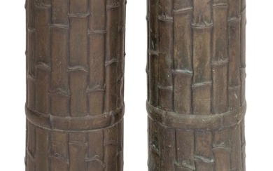 PAIR OF BRONZE UMBRELLA STANDS IN THE FORM...