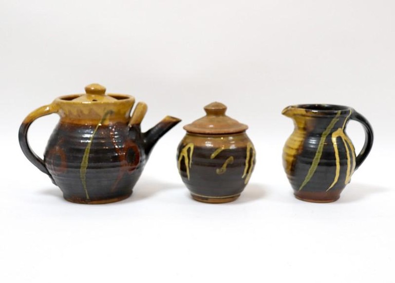 Studio Pottery, a three-piece tea service of dark glaze
