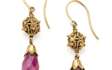 Translucent faceted ruby and yellow 12K chiseled gold pendant earrings, g 8.87 circa, length cm 4.8 circa. Marked 557 NA.