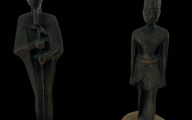 Two 20th century Ancient Egyptian style bronze figures of pharaohs...