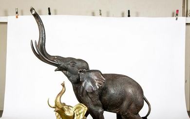 Two Cast Metal Elephants