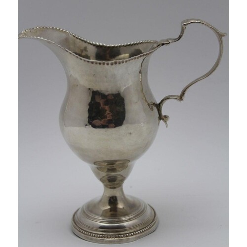 William Withers, A George III silver cream jug, of baluster ...