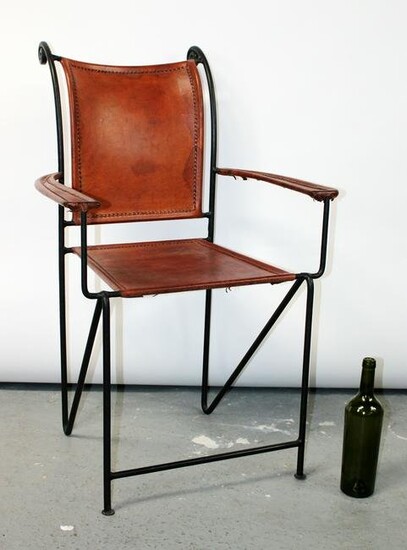 Wrought iron and stitched leather armchair