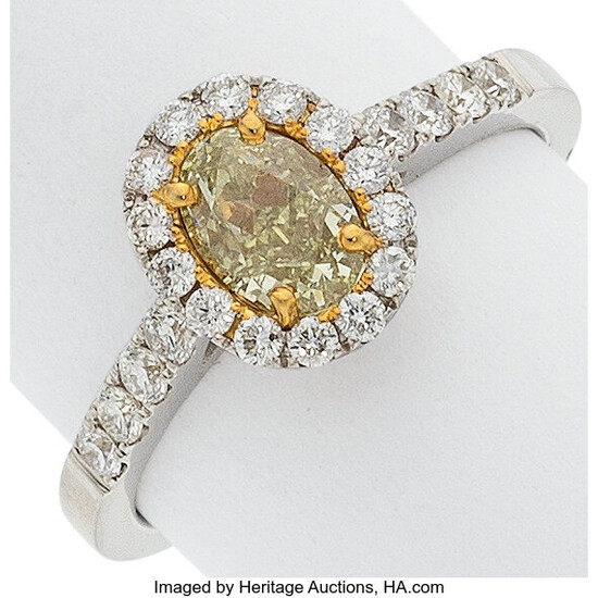 Yellow Diamond, Diamond, White Gold Ring Stones: Oval-shaped yellow...