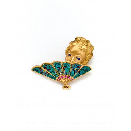 Yellow gold and enamel brooch shaped in the form of a lady with a fan, g 9.01 circa, width cm...