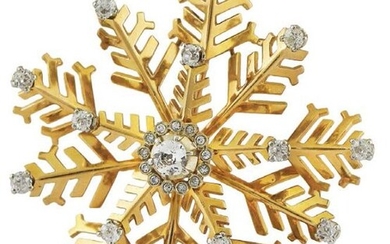 Yellow gold brooch depicting a snowflake with diamonds...