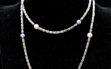 white gold necklace with pearls.