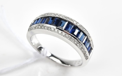 A SAPPHIRE AND DIAMOND HALF HOOP RING IN 18CT WHITE GOLD, SAPPHIRES TOTALLING 1.41CTS, APPROXIMATE TOTAL DIAMOND WEIGHT 0.20CTS