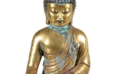 A Chinese gilt-bronze of Ratnasambhava , one of the