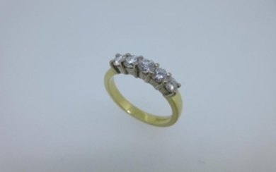 An 18ct gold and diamond five stone ring