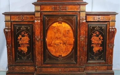 Burl walnut parlor cabinet with hand carved panels