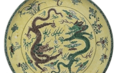 A GREEN AND AUBERGINE-DECORATED YELLOW-GROUND DISH, 18TH-19TH CENTURY
