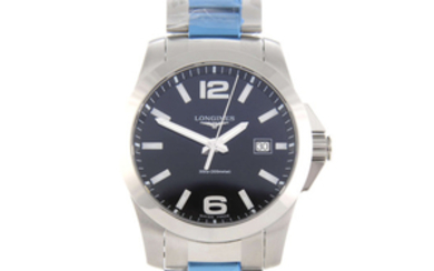 LONGINES - a gentleman's stainless steel Conquest bracelet watch.