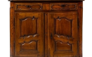 A Louis XV Provincial Walnut Cabinet