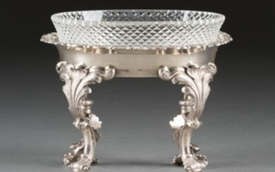 A MASSIVE SILVER TABLE DECORATION WITH GLASS INSET