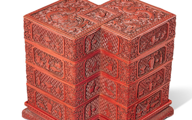 A rare carved cinnabar-lacquer tiered double-lozenge shaped box and cover