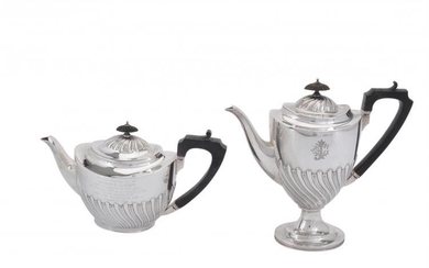 A Victorian silver oval pedestal tea pot and coffee pot by Elkington & Co.