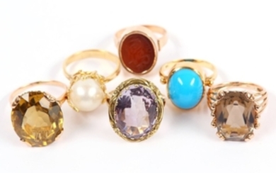 A collection of rings, including a cultured pearl...