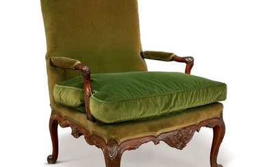 A GEORGE II MAHOGANY LIBRARY ARMCHAIR IN THE MANNER OF WRIGHT AND ELWICK, CIRCA 1755