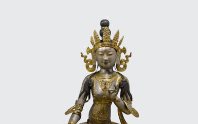 A polychrome and parcel gilt metal alloy repousse figure of white Tara