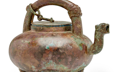 AN ARCHAIC BRONZE TRIPOD KETTLE AND COVER, HE