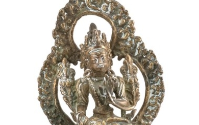 BRONZE FIGURE OF TARA Seated on a lotus throne with openwork mandala. Height 5".