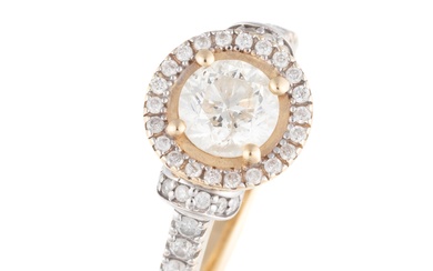 A 14CT GOLD DIAMOND CLUSTER RING