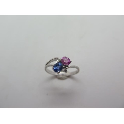 A 14ct white gold, pink and blue sapphire diamond ring, mark...