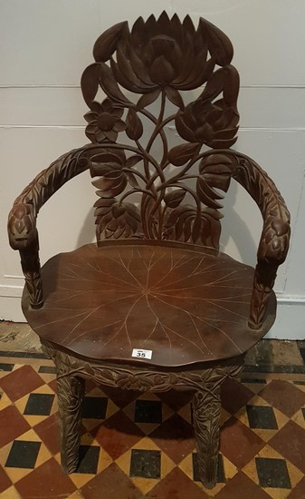 A 19th Century highly carved Kashmir Chair.