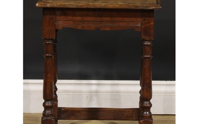 A 19th century oak joint stool, oversailing top above a moul...