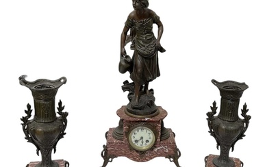 A 19th century pink marble and gilt metal mounted spelter...