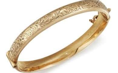 A 9CT GOLD BANGLE, the hinged bangle with bright cut