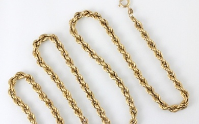 A 9ct yellow gold rope twist necklace, the bolt ring stamped...