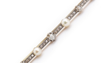 A Belle Èpoque pearl and diamond brooch set with numerous cultured pearls and old- and rose-cut diamonds, mounted in 18k gold and platinum. L. app. 8 cm. 1910.